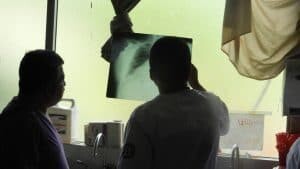Reading x-rays by window light -AMEDICAusa