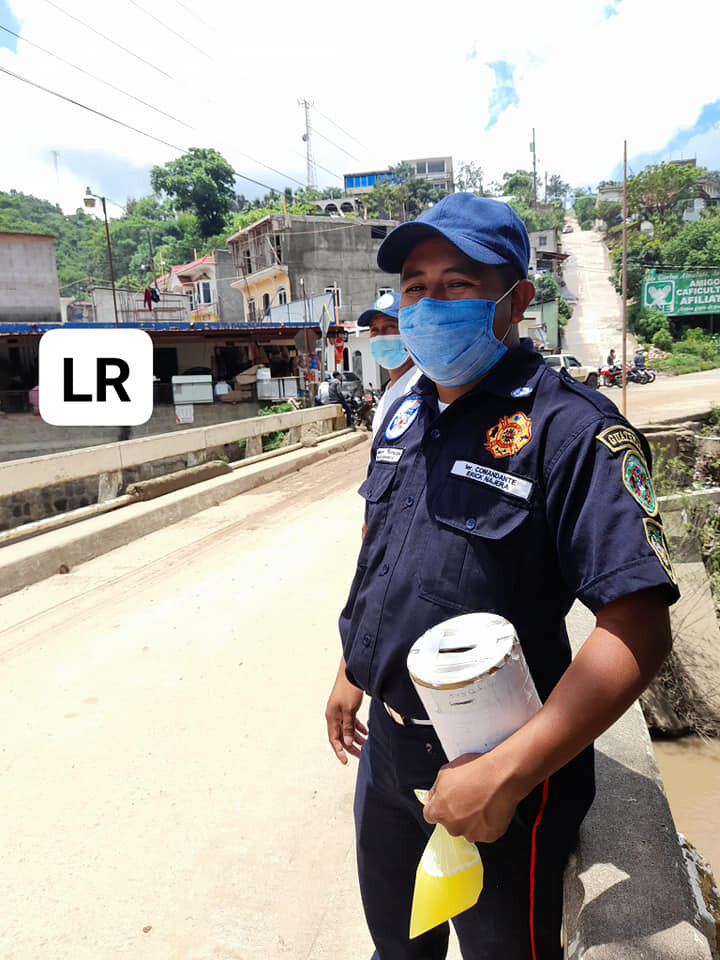 Fire Chief Erick Najera & firefighter stand at the main entrance into town collecting donations from passing motorists and pedestrians. This is also what keeps the doors open and the lights on. Why we want to donate an ambulance. 
