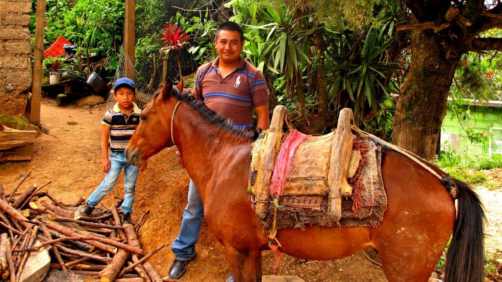 Comandante (Chief) Erick Najera at his home near Alzatate, Jalapa. His father's horse, Dragón, is the family's sole transportation. Why we want to donate an Ambulance.